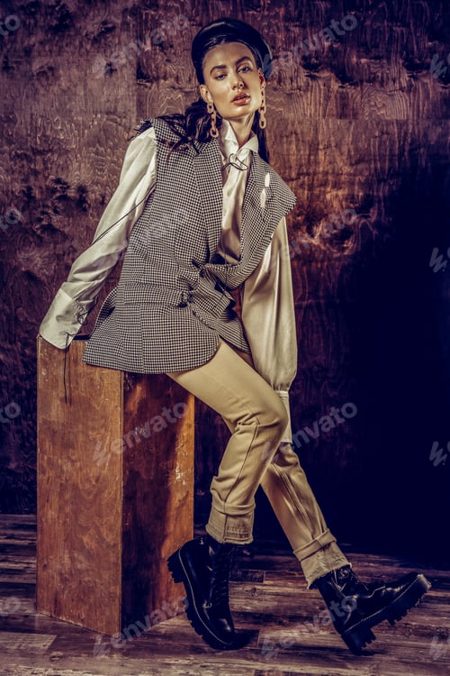 Preview: Full Length Of Gorgeous Female Wearing Stylish Clothes Sitting On High Box