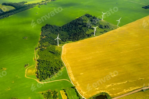 Preview: Windmills on the background of forests and fields. Windmill in nature.Belarus