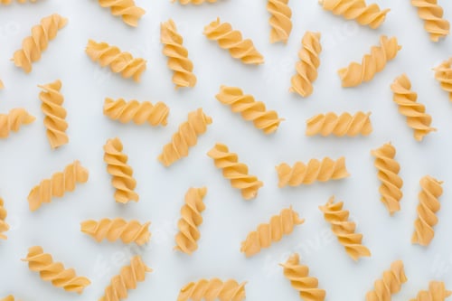 Preview: Pattern made of pasta on pastel background. Flat lay.