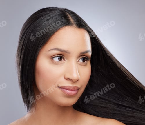 Preview: Studio shot of a beautiful young with with healthy brown hair