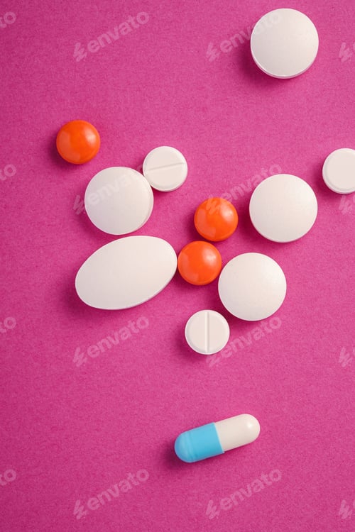 Preview: Pills and tablets on pink background, healthcare medical concept, antibiotics and cure
