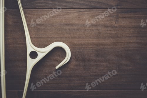 Preview: clothing hanger on brown table