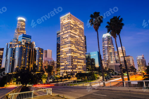 Preview: View of highway and city skyline at dusk, Los Angeles, California, USA