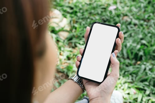 Preview: mockup image cell phone blank white screen for text. woman hand holding texting message chatting