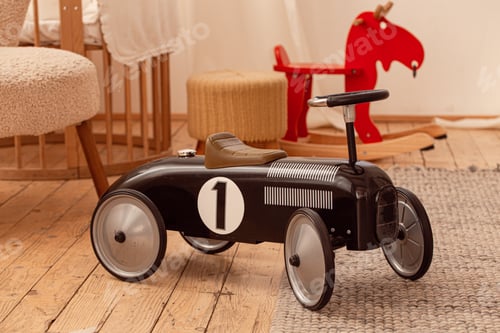 Preview: Retro black children's car in baby nursery room