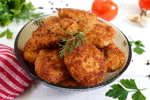 Preview: Juicy homemade cutlets (beef, pork, chicken) on a white wooden background.