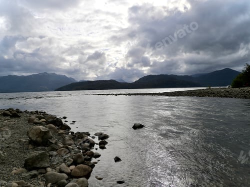 Preview: Grey sky with lake and mountain