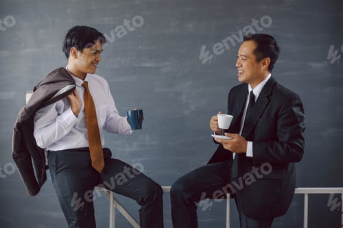 Preview: Two asian businessmen having a coffee time