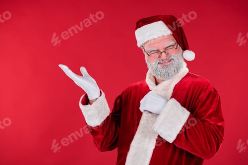 Preview: Smiling Santa Claus Waving on Red Background