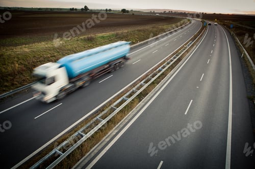 Preview: highway traffic - motion blurred truck on a highway/motorway/spe