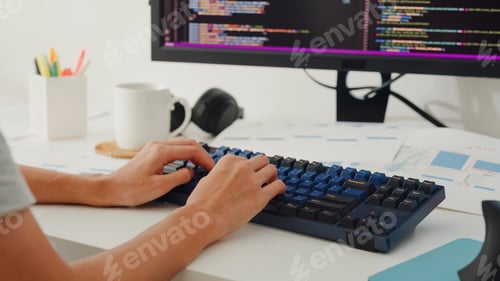Preview: Asia girl IT development programmer typing on keyboard coding programming fixing database code.