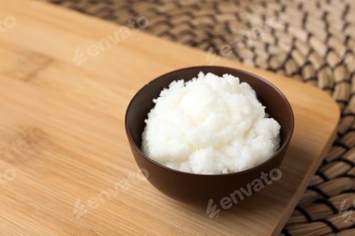 Preview: Shea butter in bowl on wooden board. Space for text