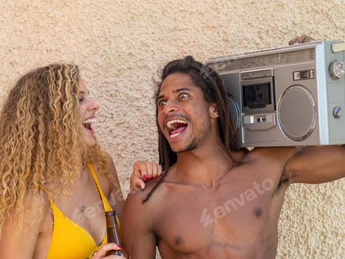Preview: Caucasian blonde girl and black boy with dreadlocks