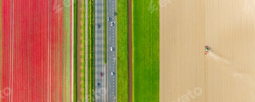 Preview: Drone view of a road in the middle of a field. Landscape from a drone. Road and transport.