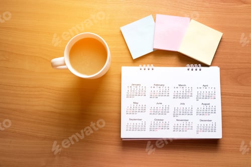 Preview: Travel Planning on Calendar and use post-it for note with a cup of coffee on a wooden table