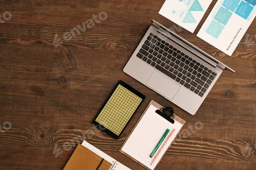 Preview: View of workplace of modern creative designer with laptop, touchpad, etc
