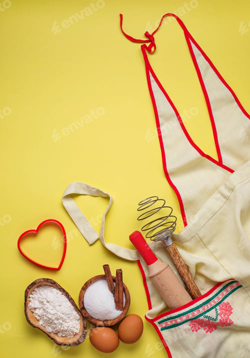Preview: Ingredients for baking on yellow background