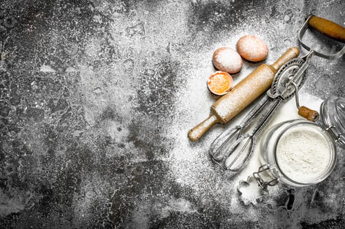 Preview: Baking background. Ingredients and tools for dough preparation.