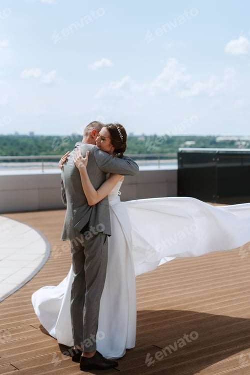 Preview: bride and groom first meeting on the roof of skyscraper