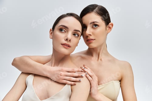 Visualização: Gêmeos em pose elegante mostram sua beleza e conexão em um ambiente sereno