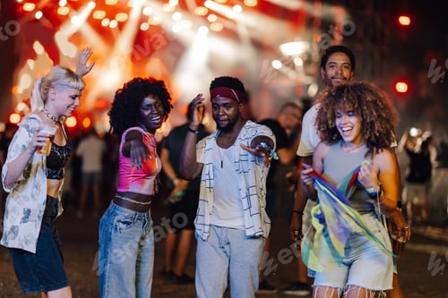 Preview: Young Adults Dancing at Outdoor Concert