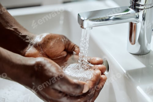 Preview: Black man, house bathroom or washing hands with water for healthcare wellness, hygiene maintenance