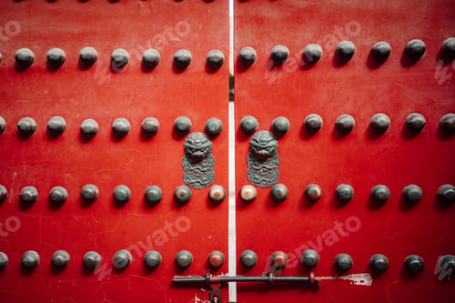 Preview: Door adorned with various metal hardware.