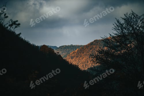 Preview: Landscape of a mountain peeks in the autumn