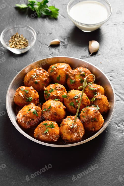 Preview: Bombay potatoes in bowl