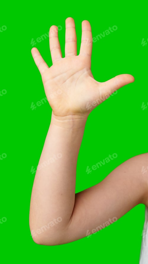 Preview: A child's hand raised in greeting against a bright green background