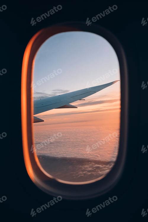 Preview: Beautiful sunset look through airplane window