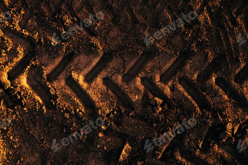 Preview: Pattern of tractor tire track imprint in dirt road dried muddy ground