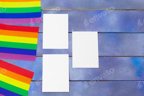 Preview: Bright rainbow gay flag on wooden background and blank space