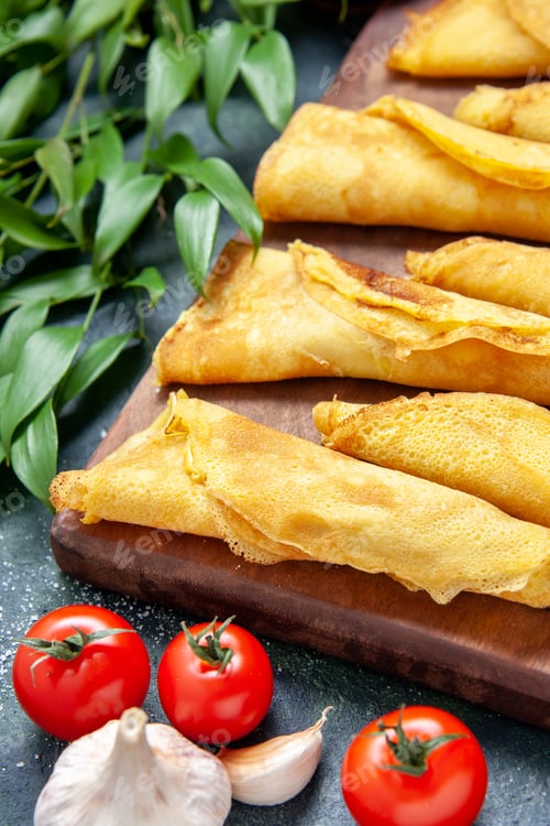 Preview: front close view delicious rolled pancakes on a dark background color meal pie meat pastry hotcake