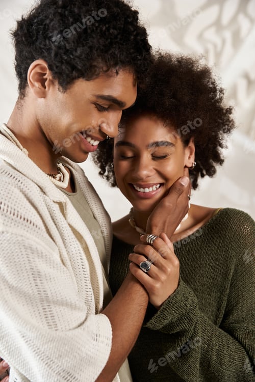 Preview: Young couple sharing an intimate moment in a stylish and aesthetic setting indoors