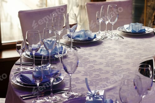 Preview: luxury decorated tables at rich wedding reception