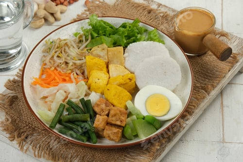 Preview: Gado Gado Indonesian Mix vegetables Salad from Boiled or Steam Vegetable Served with Peanut Sauce.