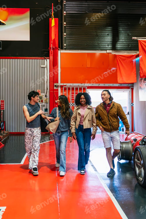 Preview: Diverse friends walking, enjoying day at go kart track