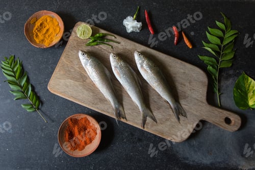 Preview: Raw fish on a wooden platter