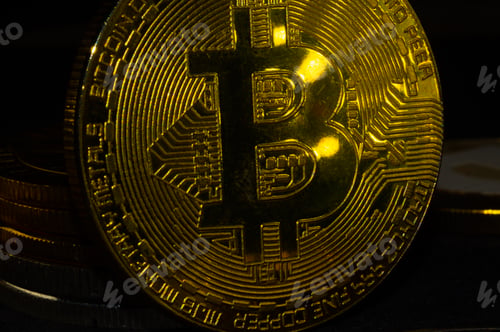 Preview: Closeup shot of a shiny Bitcoin coin