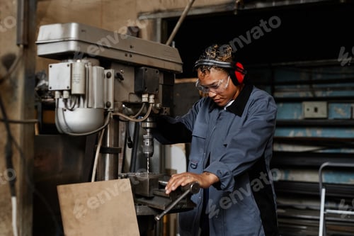 Preview: Woman At Metalworking Factory