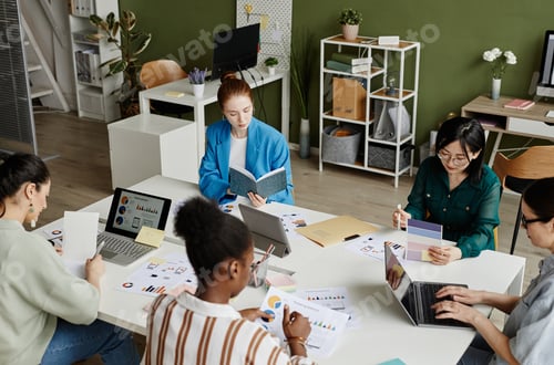 Preview: Group of female coworkers working at office