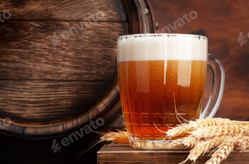 Preview: Mug of light lager beer and old wooden barrel