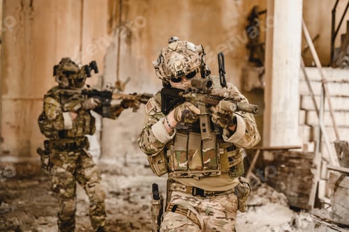 Preview: Expert team of soldiers with weapons attacking enemy