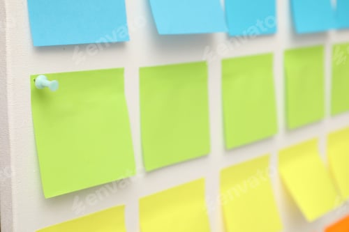 Preview: Blank colorful paper notes on white board, closeup