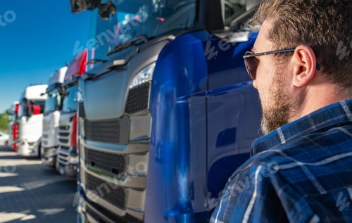 Preview: Transportation Industry Business Owner and His Semi Trucks Fleet