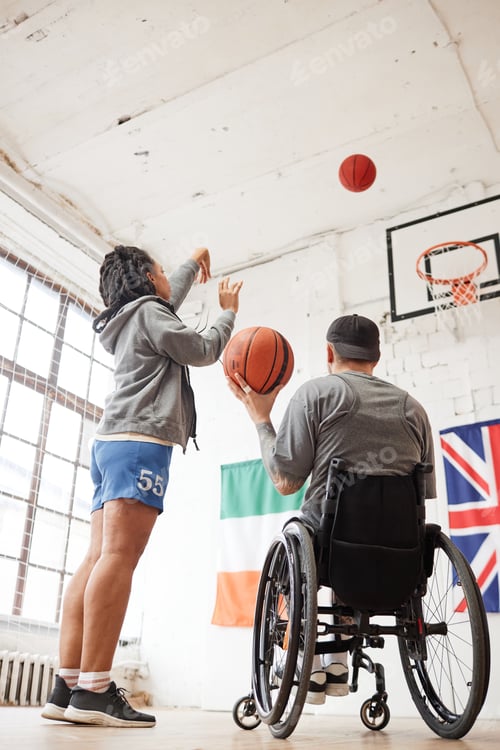 Preview: Back View Sportsman Using Wheelchair in Basketball Practice