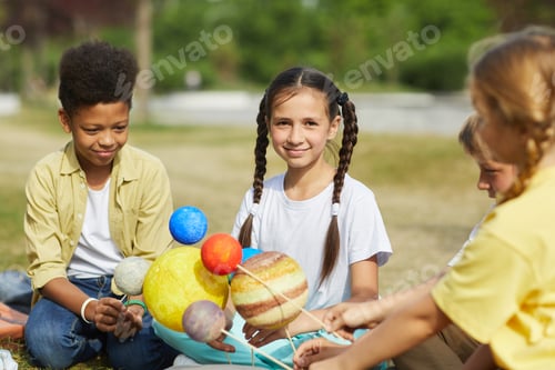 Preview: Group of Kids Planning Group Project for Astronomy Lesson