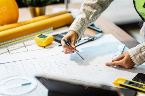 Preview: Female architect engineer is drafting blueprints using CAD software, focusing on sustainable
