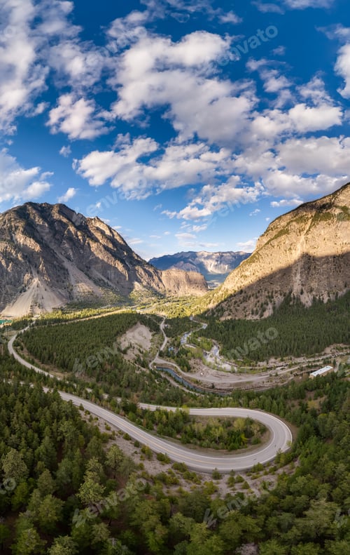 Preview: Aerial View of Curved Road Among Mountains and Forest in BC, Canada